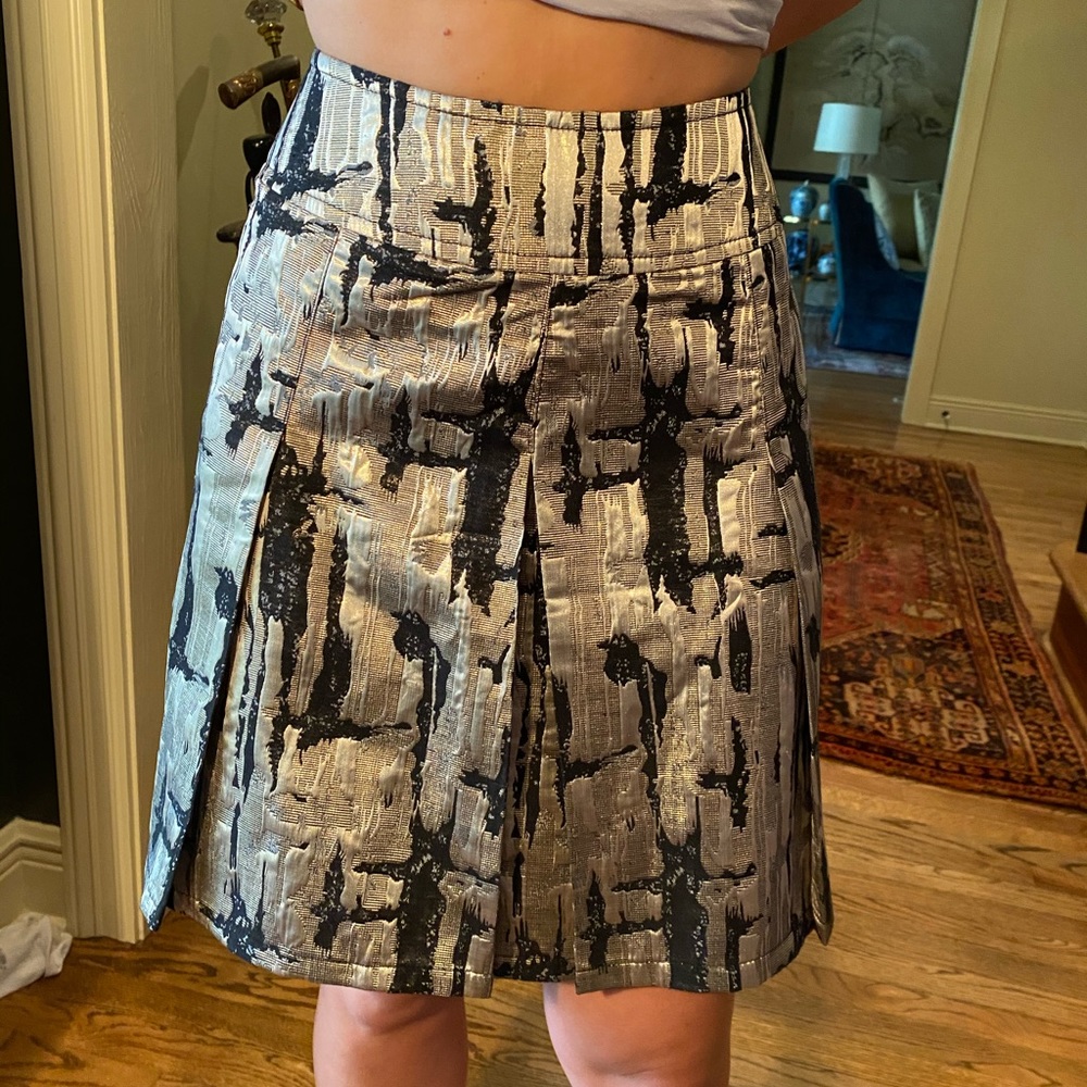 Pleated gold skirt